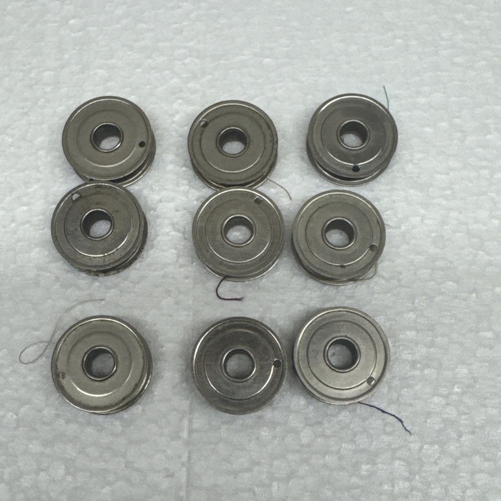 Lot of 9 Sewing Machine Bobbins One Hole vintage Metal Flat